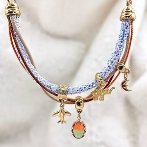 Necklace  with light blue frosty Murano Leather and golfi gold